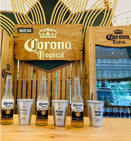Corona Sunsets con vasos reusables Xiclo